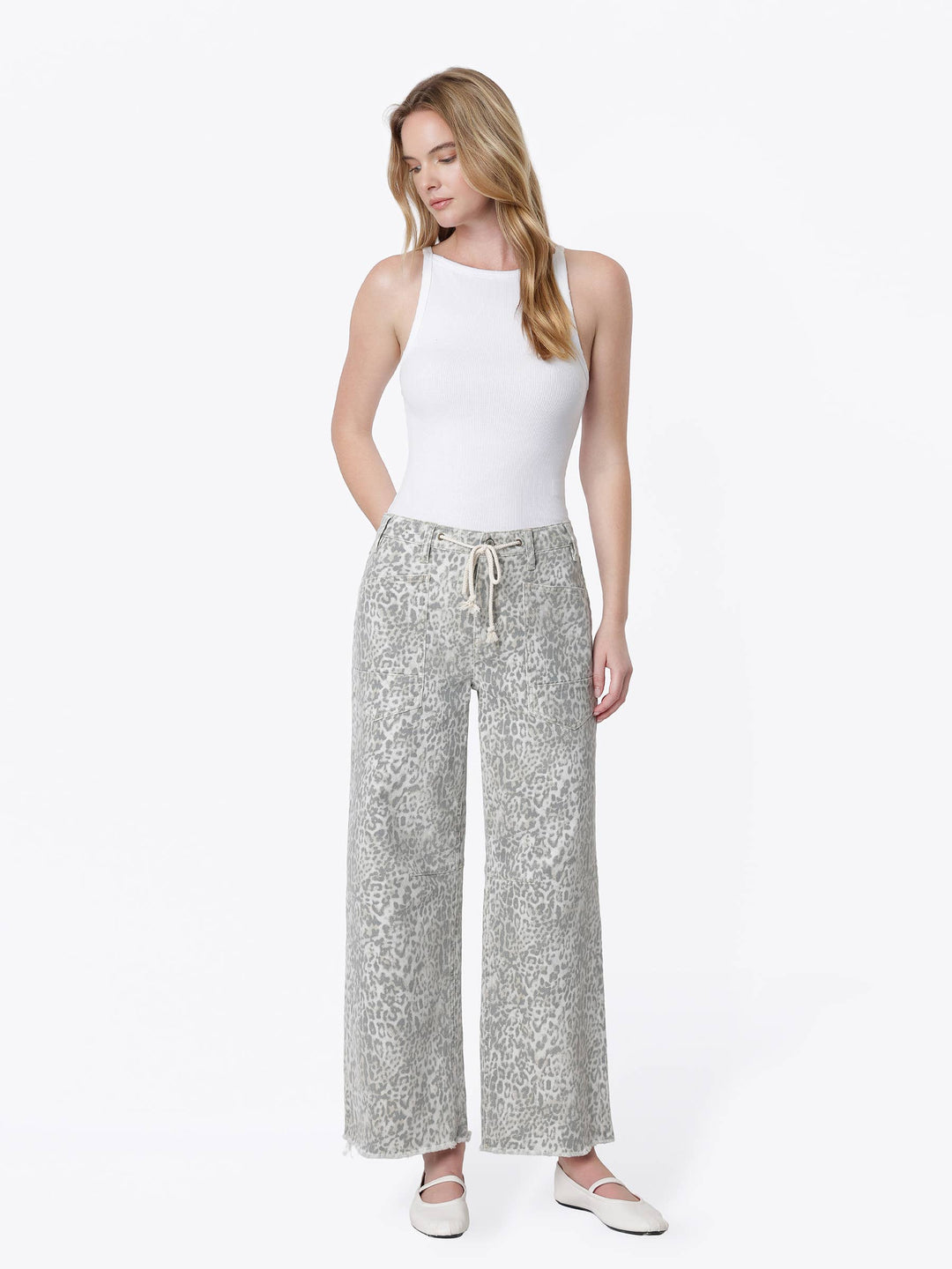 Neutral gray and cream leopard print wide-leg jeans with a high-rise drawstring waist, oversized front patch pockets, ankle length, and raw hem.